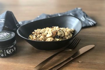 salade van parelcouscous met paddenstoelen en ui