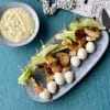 Caesarsalade op een stokje